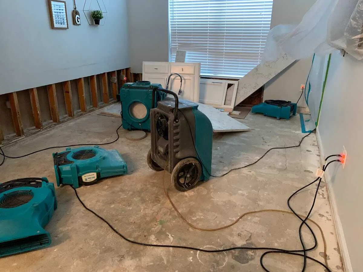 Dehumidifier in flood-cut room for Water Damage Restoration in Old Fig Garden